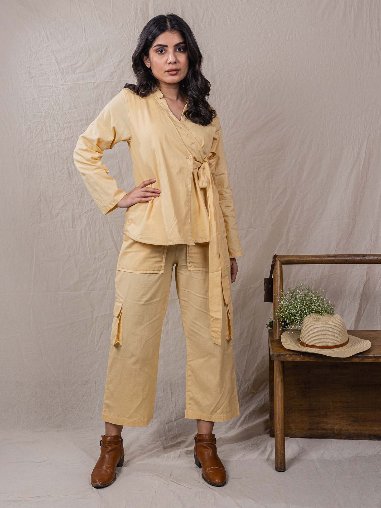 two piece set of top and pants, the overlap look of shirt with flap on one side, cargo pants, leaf embroidery on top, big pockets on cargo