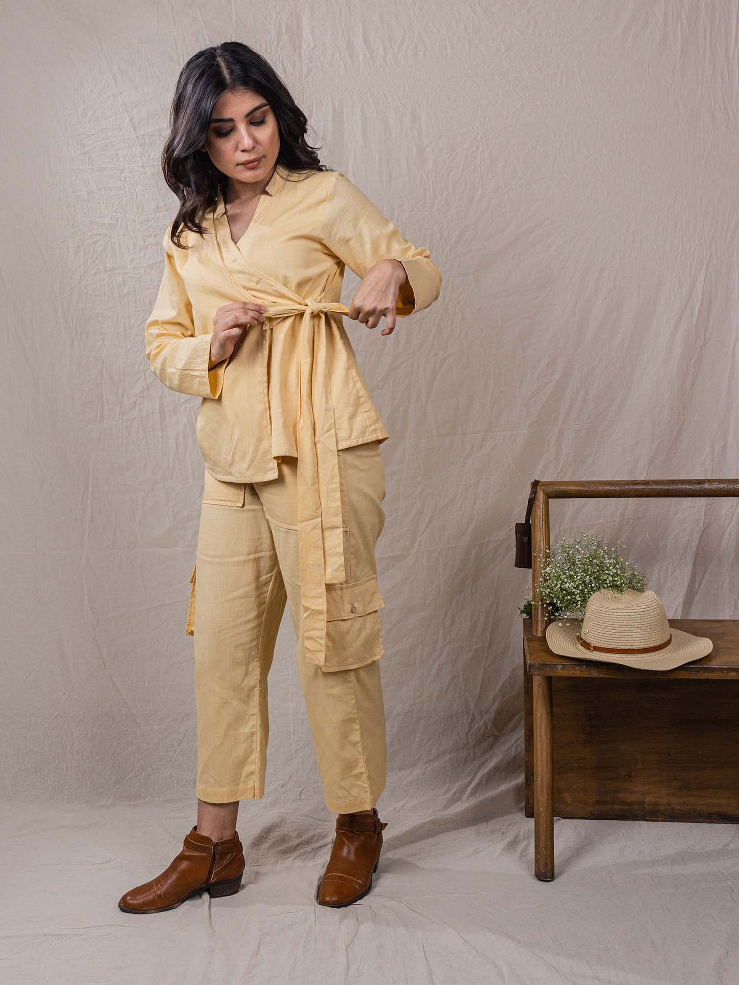 two piece set of top and pants, the overlap look of shirt with flap on one side, cargo pants, leaf embroidery on top, big pockets on cargo