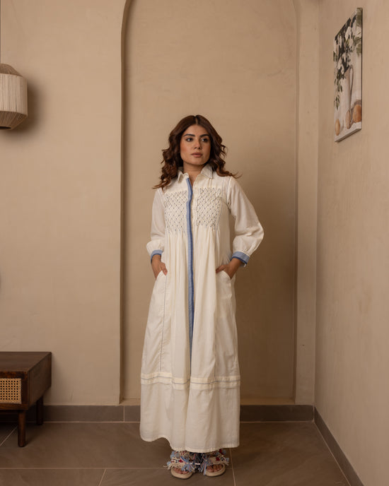 Sage Dress in beige with navy smocking and detailed collar by OurDve