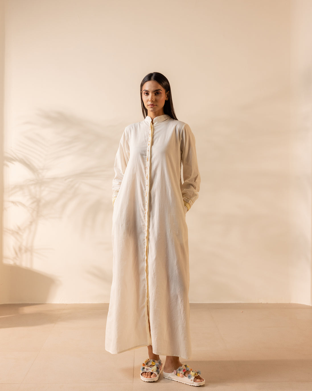 Whimsy Beige cotton long dress with floral embroidery and full sleeves