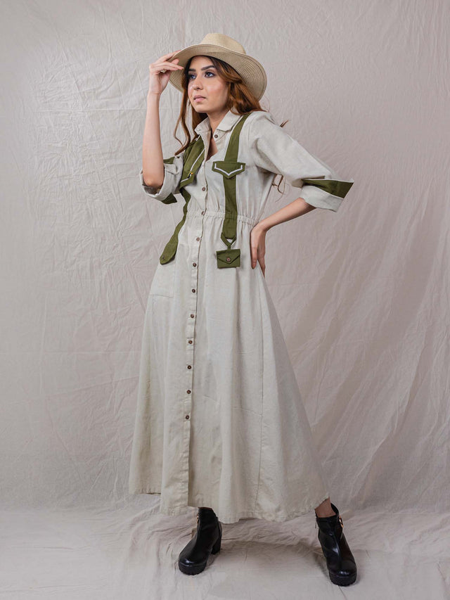 Bask Dress is A line dress with contrast details with pelican embroidery, with small pocket details, contrast panel, button down, cinched waistline, flamingo motif at back which signifies OurDve’s safari collection