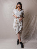 drawstring button down dress jacket in beige handwoven fabric. with collars and hand embroidery and handwork details.
