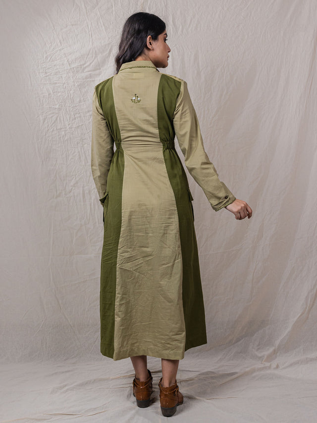 trench dress jacket, cinched around waist, with pockets, embroidered back, power shoulders, button down, detail of buttons on sleeves