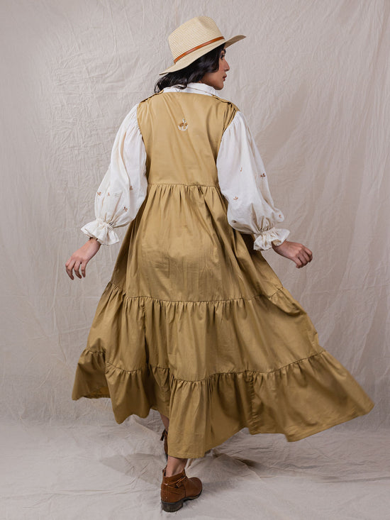 Pod Dress is perfect safari dress with detailed embroidery on sleeve, puff cuffs, attached collar shirt, with square neck dress, tiered bottom with cinched waistline