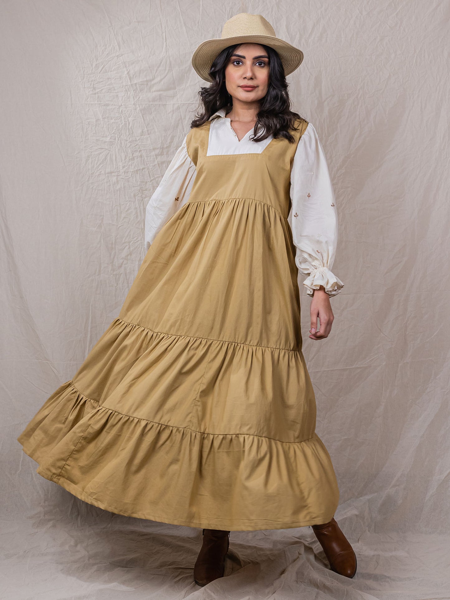 Pod Dress is perfect safari dress with detailed embroidery on sleeve, puff cuffs, attached collar shirt, with square neck dress, tiered bottom with cinched waistline