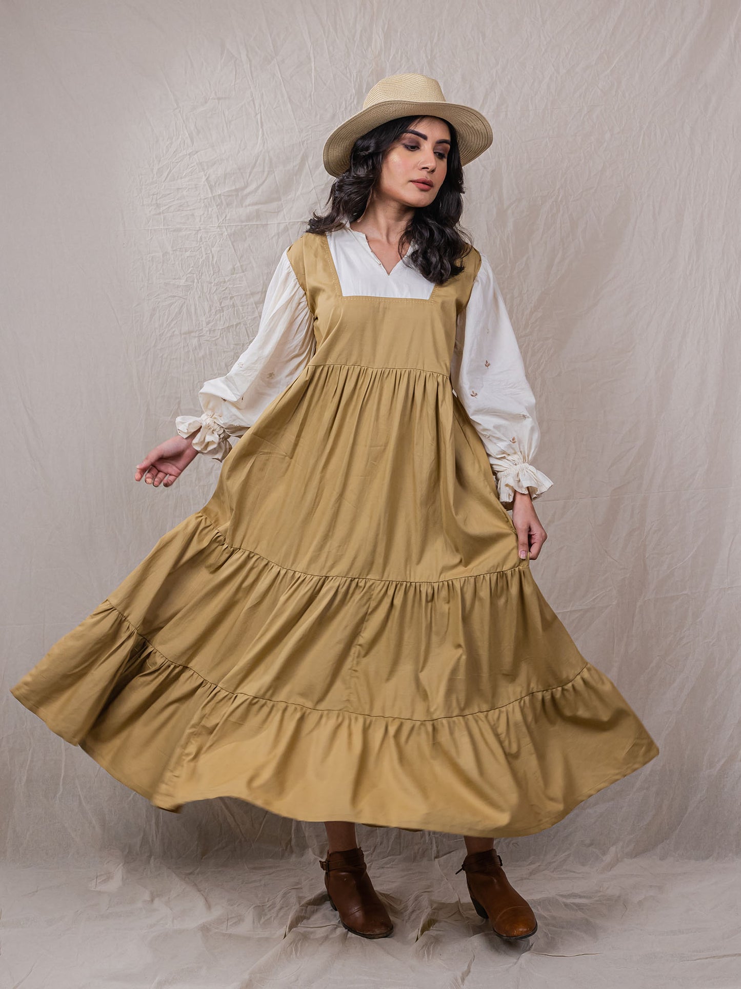 Pod Dress is perfect safari dress with detailed embroidery on sleeve, puff cuffs, attached collar shirt, with square neck dress, tiered bottom with cinched waistline