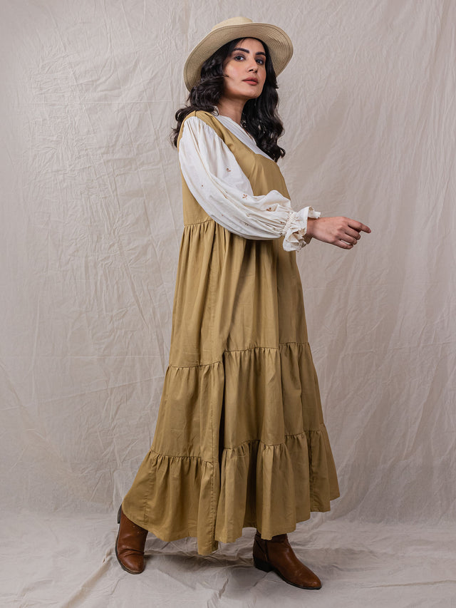 Pod Dress is perfect safari dress with detailed embroidery on sleeve, puff cuffs, attached collar shirt, with square neck dress, tiered bottom with cinched waistline
