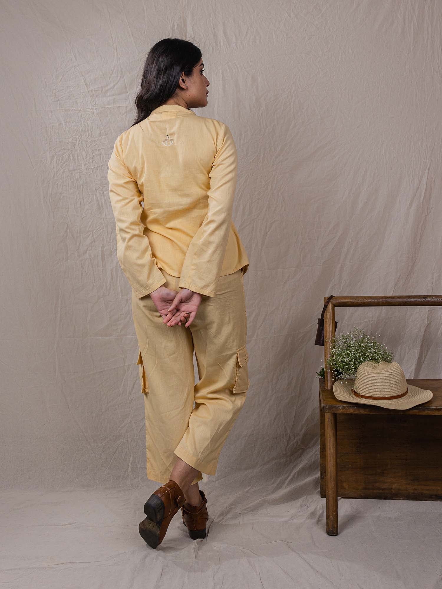 two piece set of top and pants, the overlap look of shirt with flap on one side, cargo pants, leaf embroidery on top, big pockets on cargo