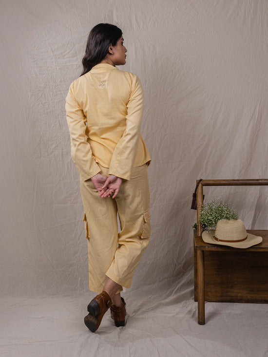 two piece set of top and pants, the overlap look of shirt with flap on one side, cargo pants, leaf embroidery on top, big pockets on cargo