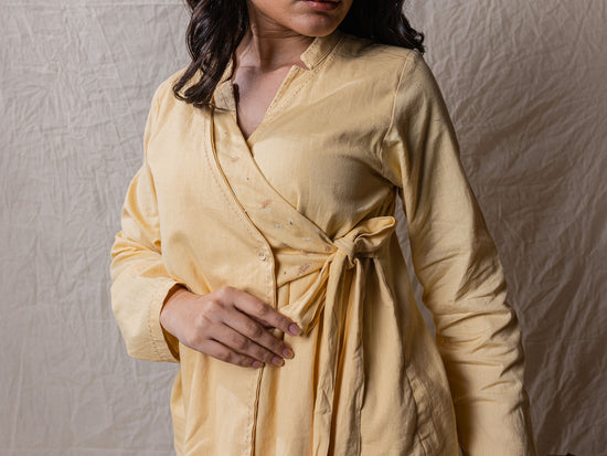 two piece set of top and pants, the overlap look of shirt with flap on one side, cargo pants, leaf embroidery on top, big pockets on cargo