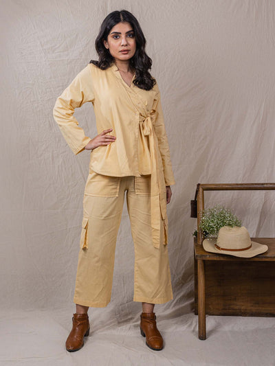 two piece set of top and pants, the overlap look of shirt with flap on one side, cargo pants, leaf embroidery on top, big pockets on cargo