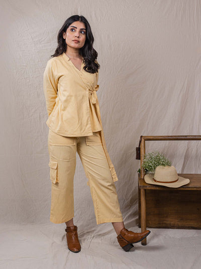 two piece set of top and pants, the overlap look of shirt with flap on one side, cargo pants, leaf embroidery on top, big pockets on cargo